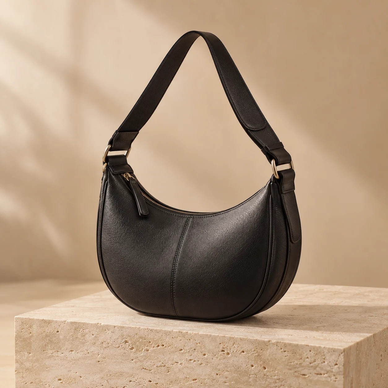 Vela Crescent Bag in black, bag product photograph